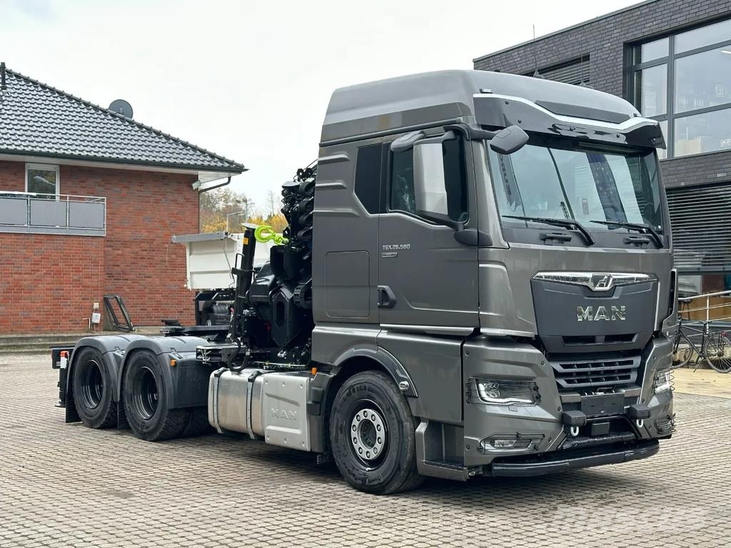 MAN TGX 33.580 MAN TGX 33.580 6x4 Kran Hiab 302-6 + Ji All-Terrain-Krane
