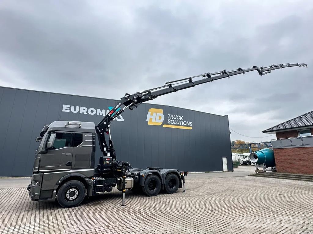 MAN TGX 33.580 MAN TGX 33.580 6x4 Kran Hiab 302-6 + Ji All-Terrain-Krane