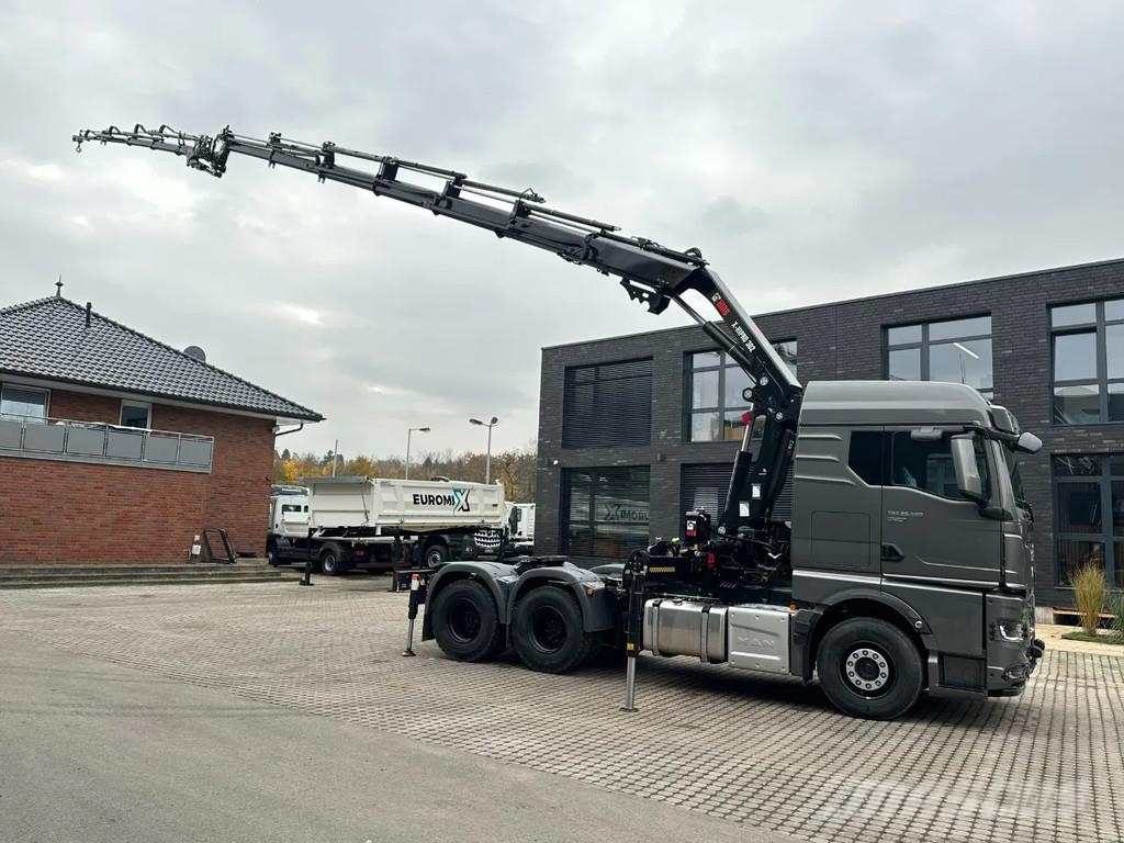 MAN TGX 33.580 MAN TGX 33.580 6x4 Kran Hiab 302-6 + Ji All-Terrain-Krane