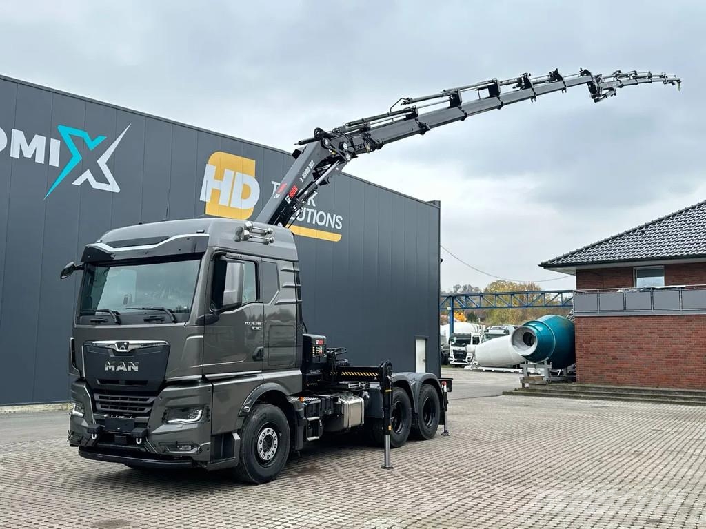 MAN TGX 33.580 MAN TGX 33.580 6x4 Kran Hiab 302-6 + Ji All-Terrain-Krane