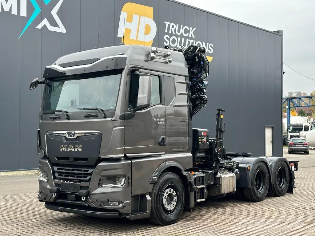 MAN TGX 33.580 MAN TGX 33.580 6x4 Kran Hiab 302-6 + Ji All-Terrain-Krane