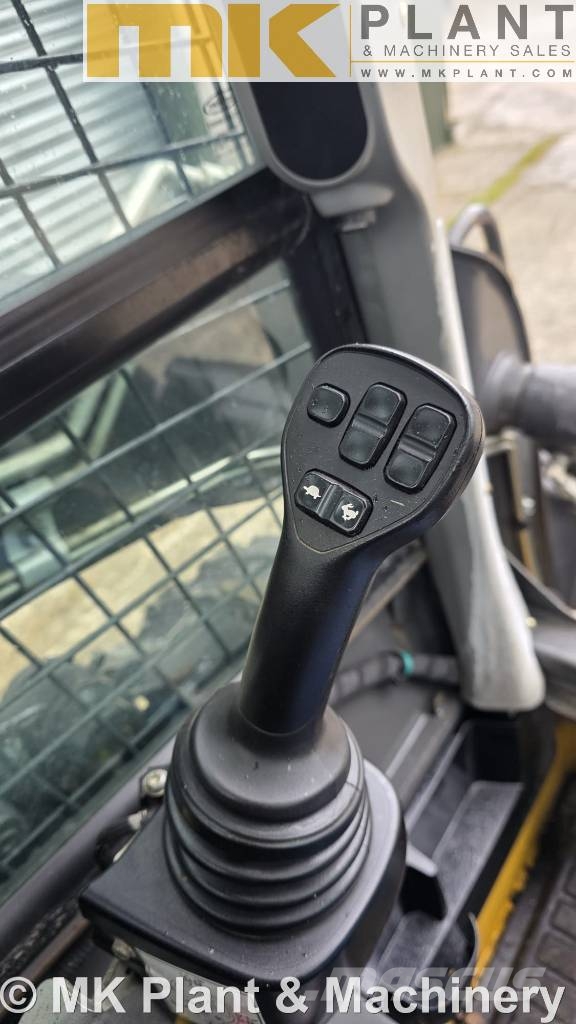 New Holland L 318 Φορτωτάκια