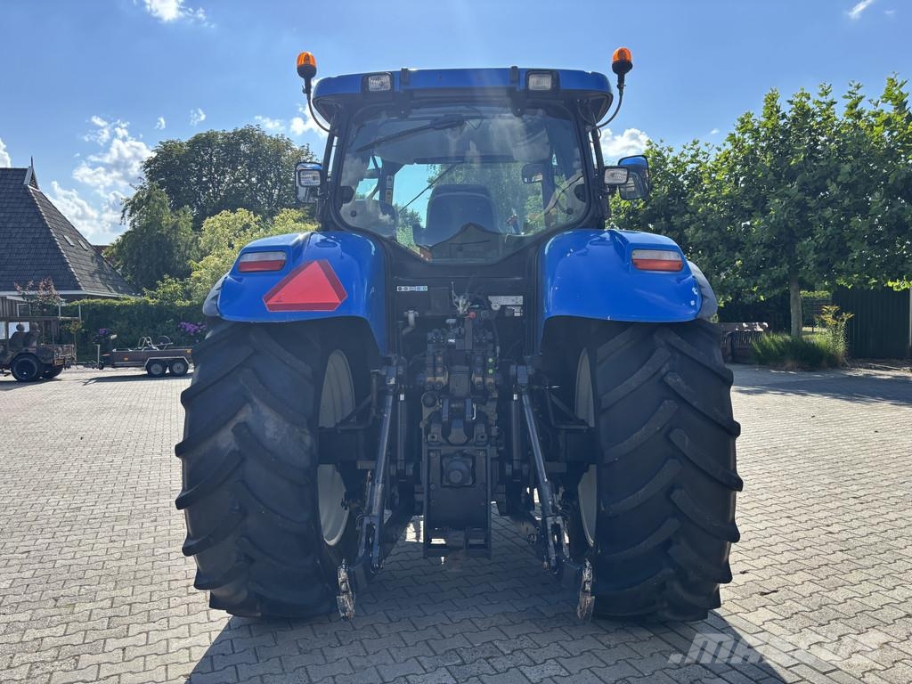 New Holland T7030 PowerCommand. Fronthef, Vooras vering, 40km. Tracteur