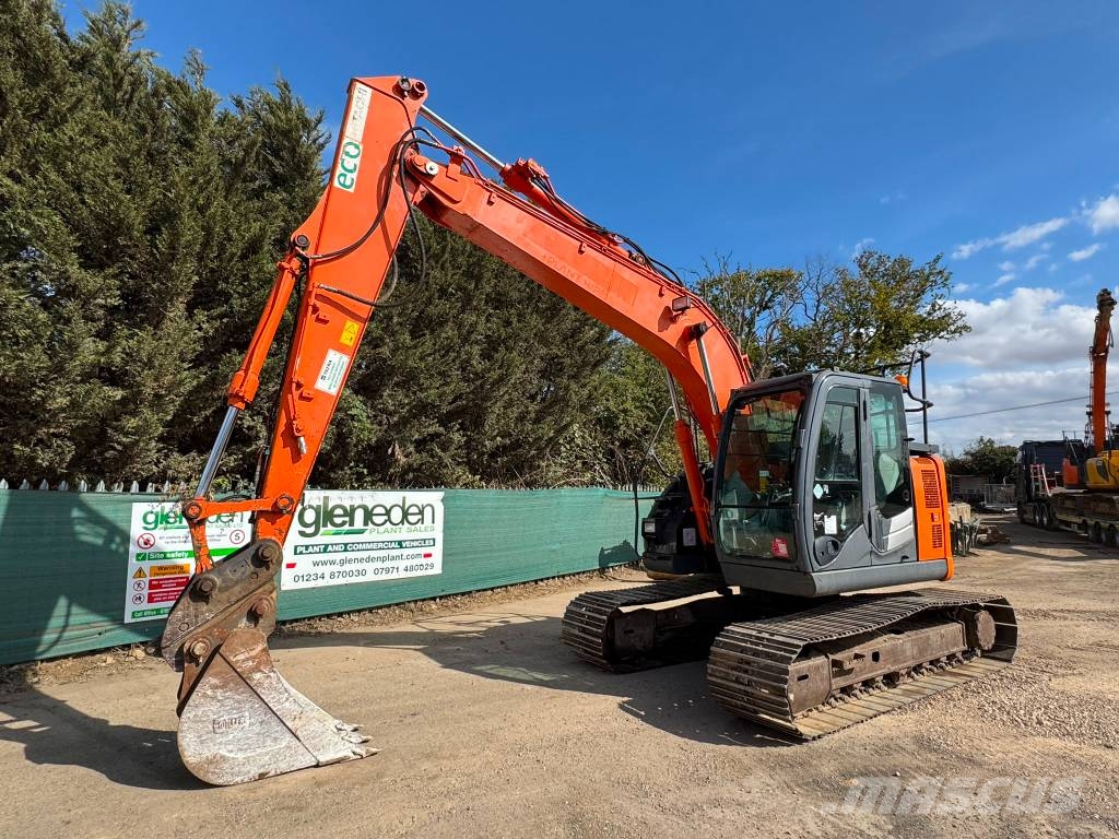 Hitachi ZX 135 US-6 حفارات زحافة