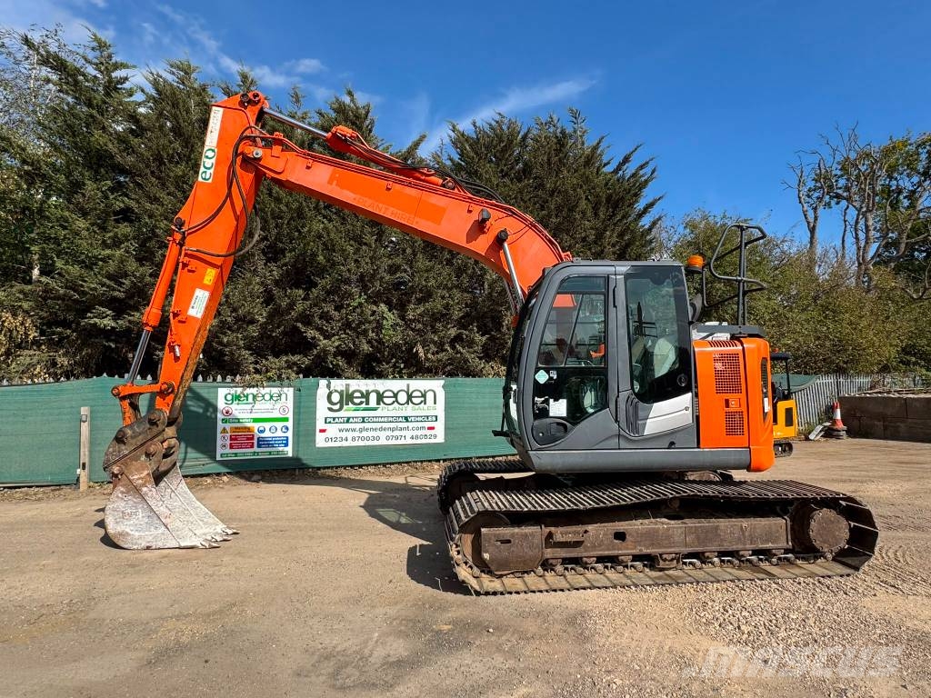 Hitachi ZX 135 US-6 حفارات زحافة