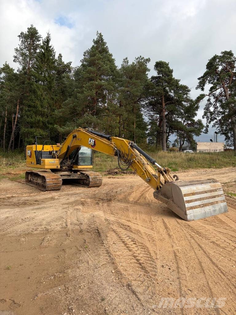 CAT 323 Vikšriniai ekskavatoriai