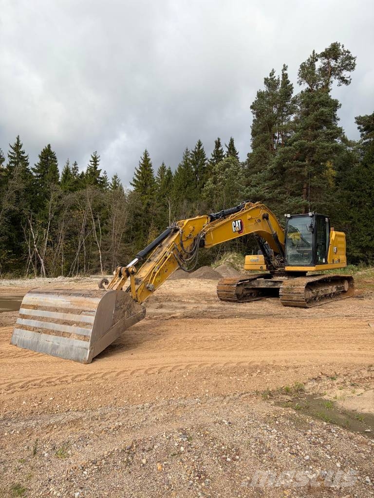 CAT 323 Vikšriniai ekskavatoriai
