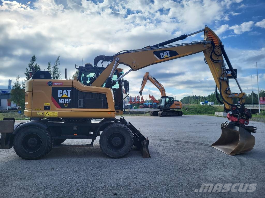 CAT M 315 F Ratiniai ekskavatoriai