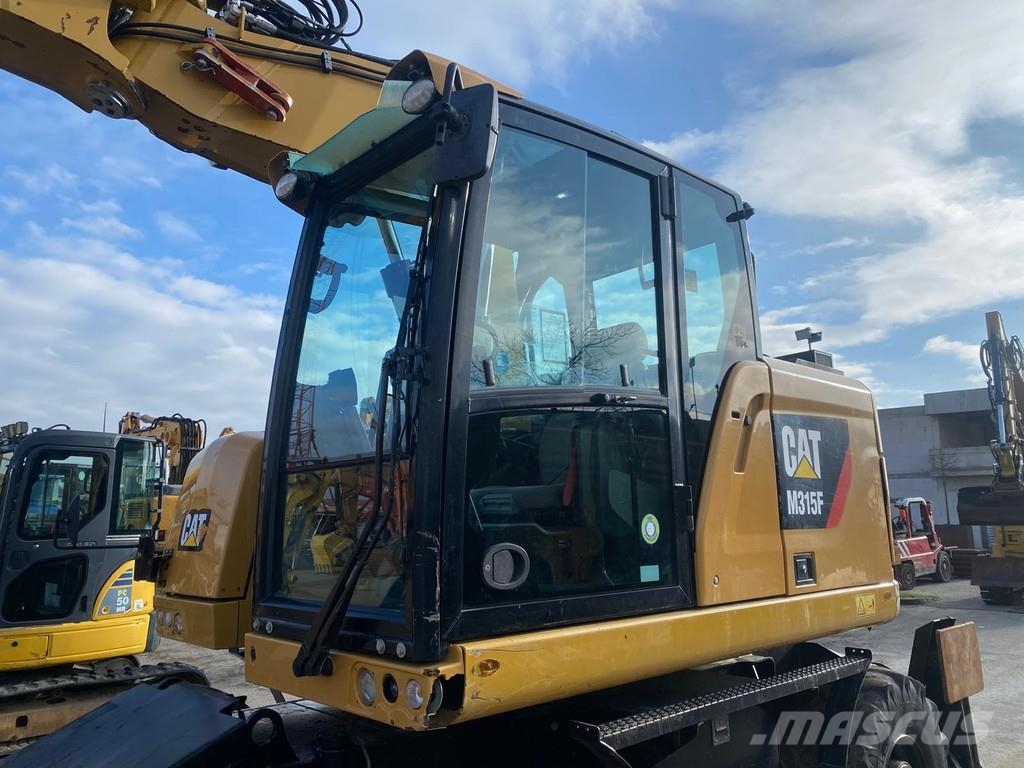 CAT M315F . Pyöräkaivukoneet