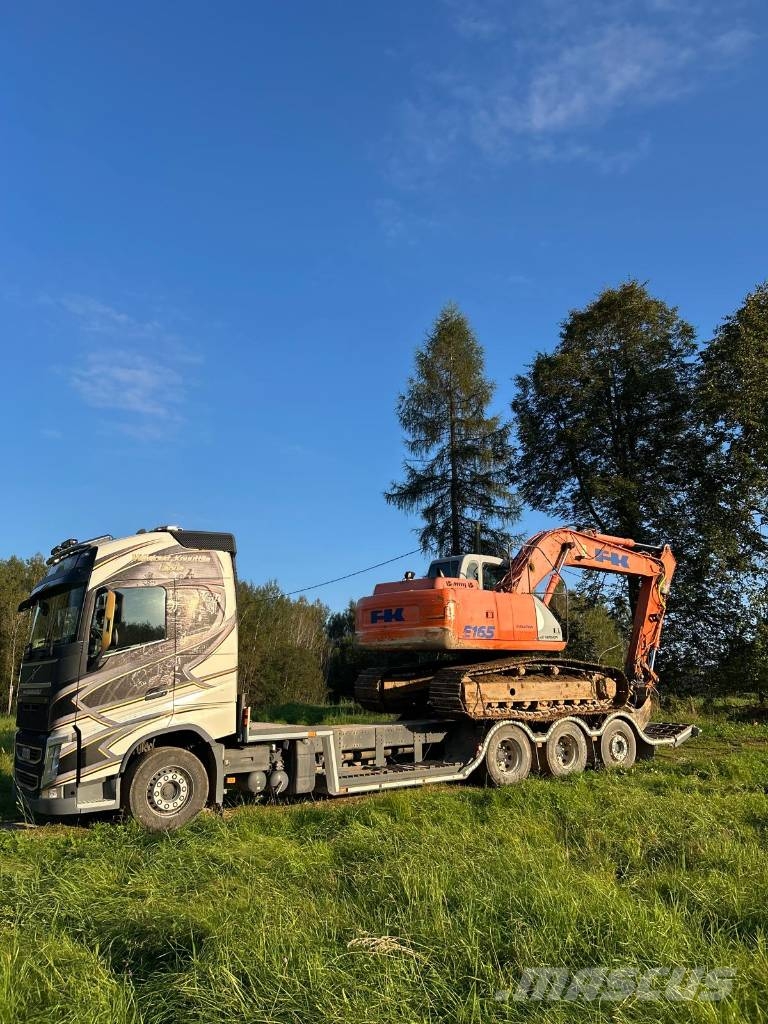 Volvo FH 500 Kamioni za prijevoz šumskih strojeva