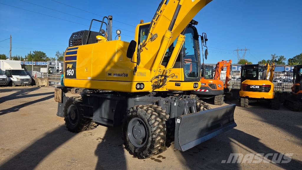 Komatsu PW 160-11 حفارات بعجل