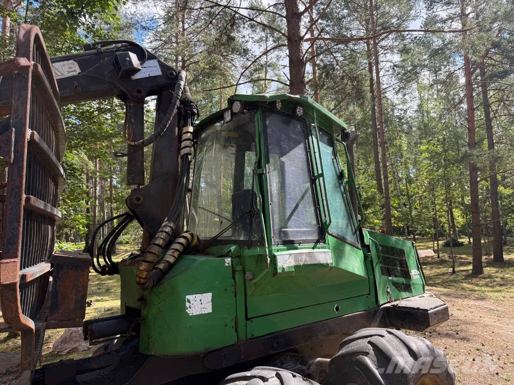 John Deere 810 D Eco III Lassbærere