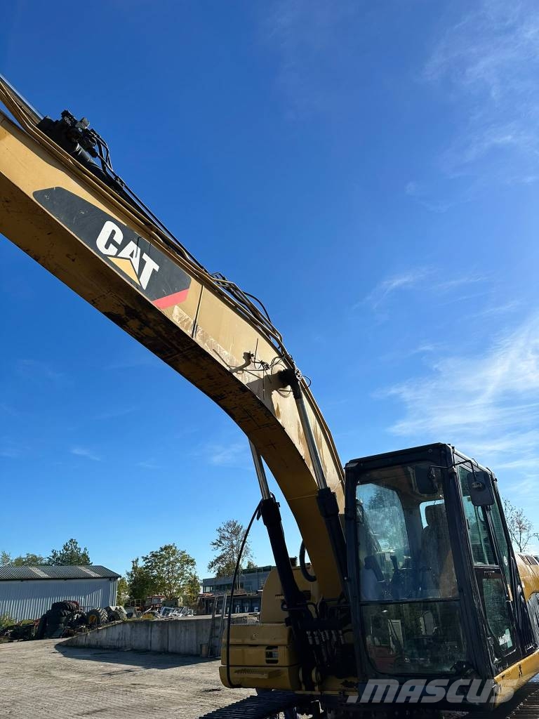 CAT 323DL Bagri goseničarji