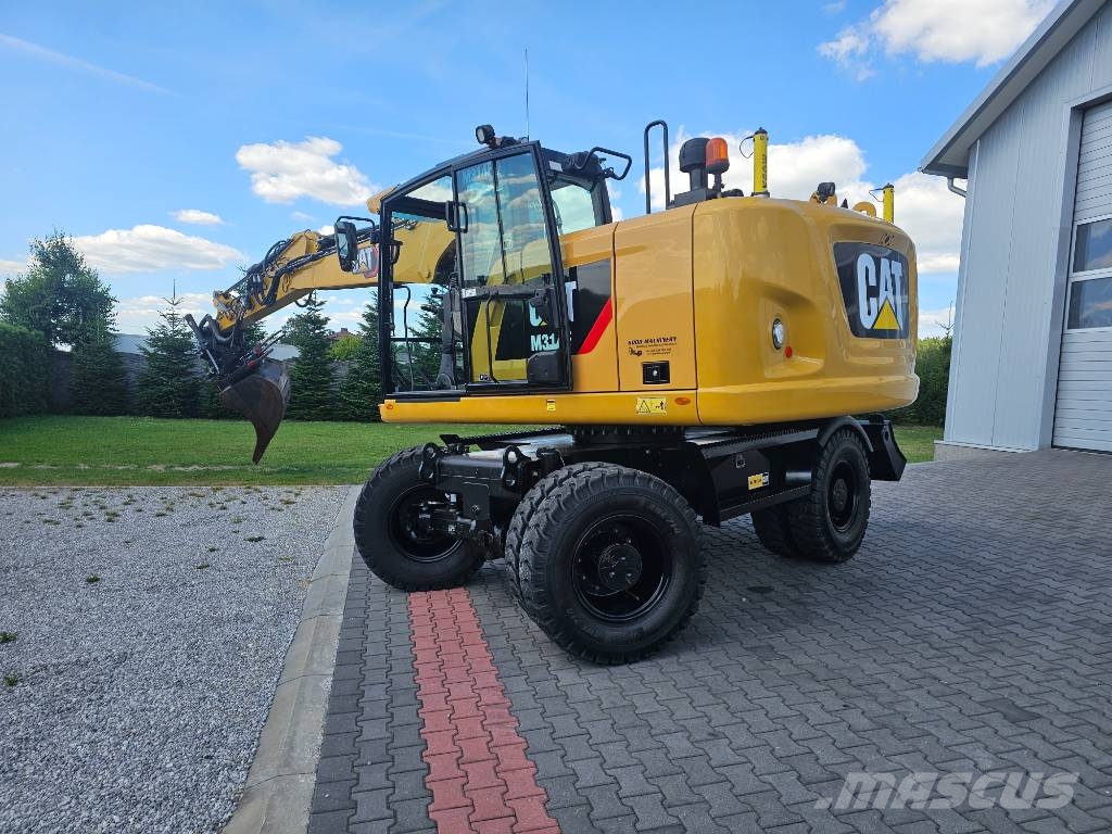 CAT M 314 F Wielgraafmachines