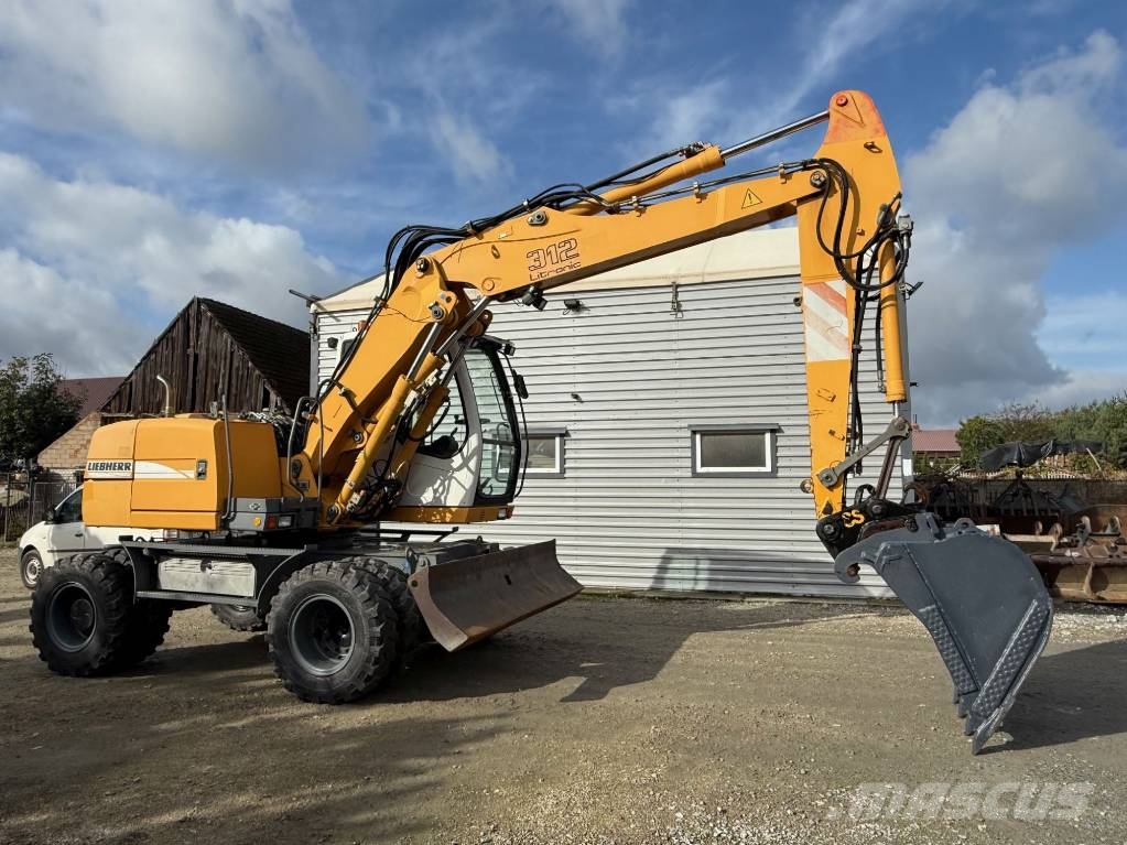 Liebherr A 312 Колісні екскаватори