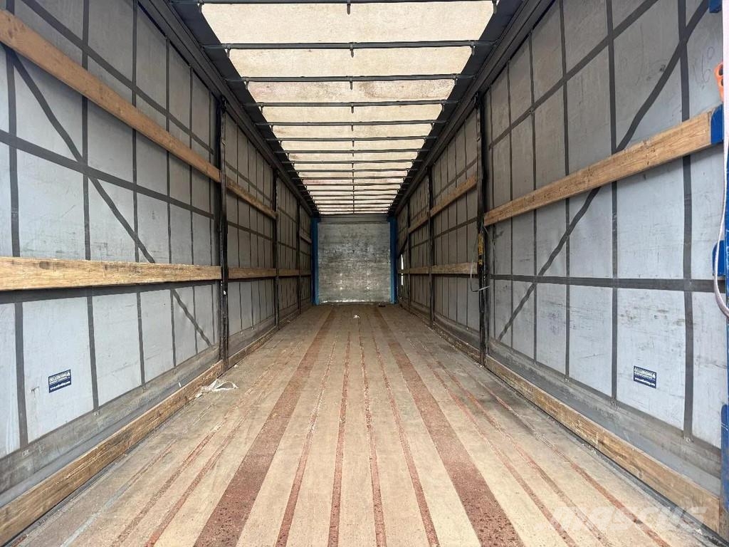 Krone 2 AXLE MET STUURAS & HARDHOUTENVLOER Semirremolques de caja de lona