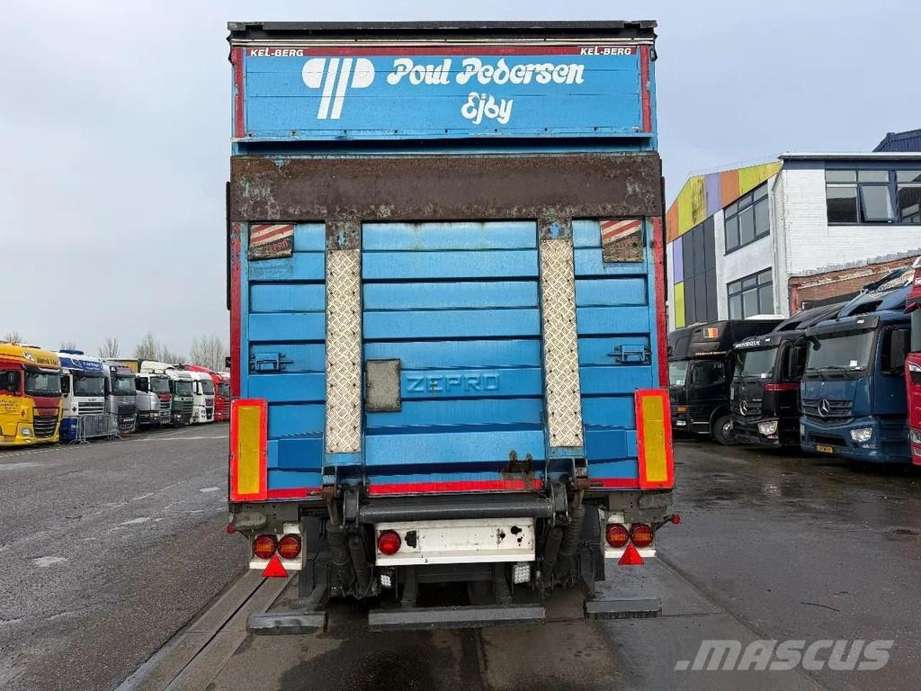 Krone 2 AXLE MET STUURAS & HARDHOUTENVLOER Semirremolques de caja de lona