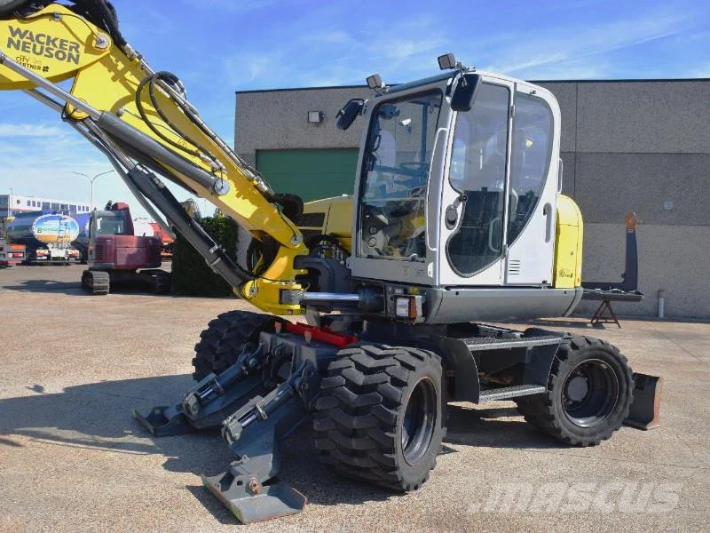 Wacker Neuson EW100 wheel-excavator Model E06-06 Midigraafmachines 7t - 12t