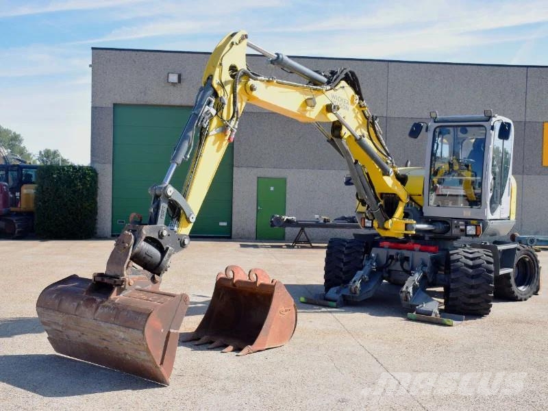 Wacker Neuson EW100 wheel-excavator Model E06-06 Midigraafmachines 7t - 12t
