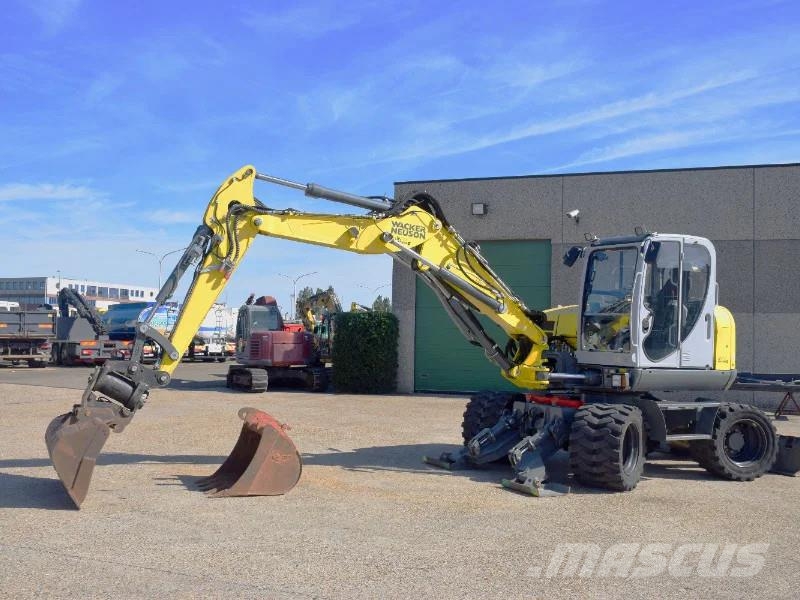 Wacker Neuson EW100 wheel-excavator Model E06-06 Midigraafmachines 7t - 12t