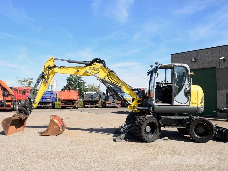 Wacker Neuson EW100 wheel-excavator Model E06-06 Midigraafmachines 7t - 12t