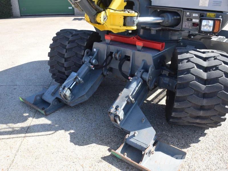 Wacker Neuson EW100 wheel-excavator Model E06-06 Midigraafmachines 7t - 12t