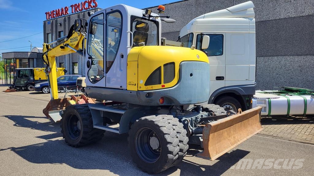 Wacker Neuson EW100 wheel-excavator Model E06-06 Midigraafmachines 7t - 12t