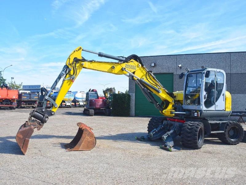 Wacker Neuson EW100 wheel-excavator Model E06-06 Midigraafmachines 7t - 12t
