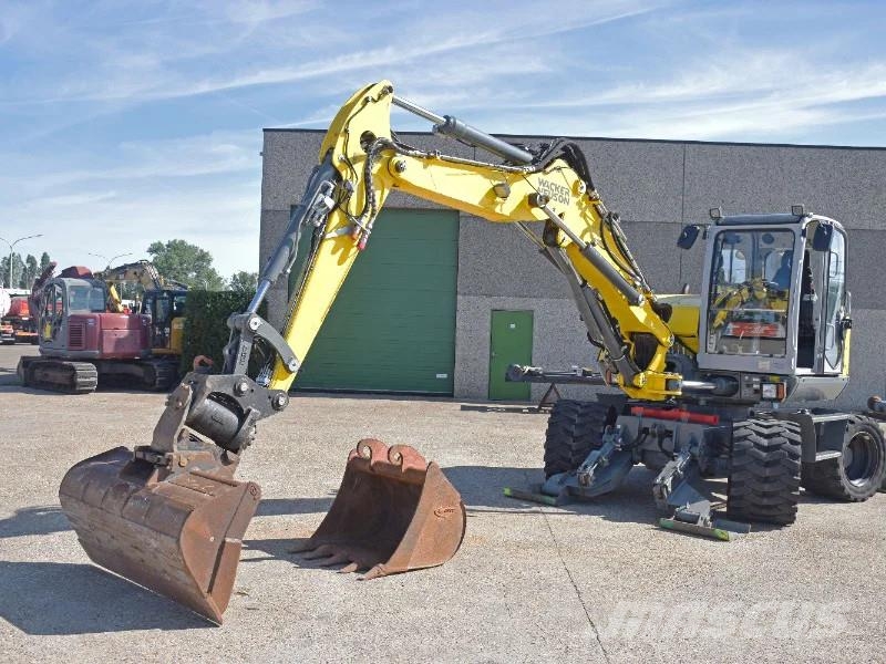 Wacker Neuson EW100 wheel-excavator Model E06-06 Midigraafmachines 7t - 12t