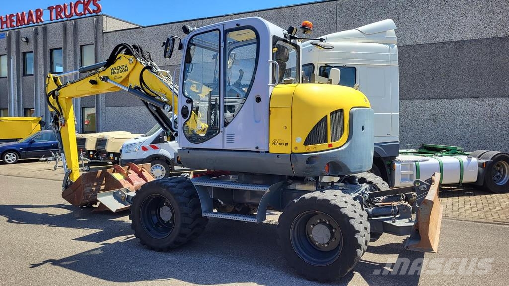 Wacker Neuson EW100 wheel-excavator Model E06-06 Midigraafmachines 7t - 12t