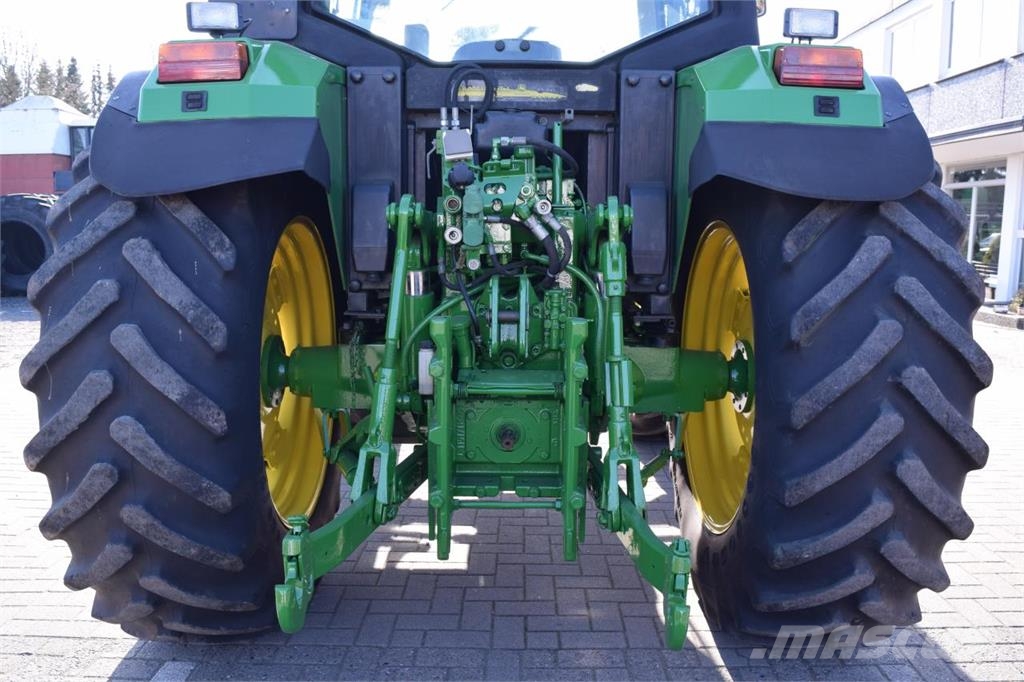 John Deere 6410 الجرارات