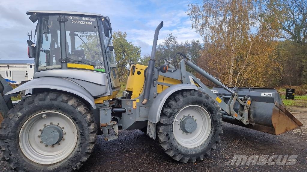 Lännen 8800 E لوادر ذات جرافات عكسية
