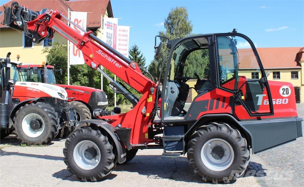 Schäffer 6680 T-3 mit Kabine フロントローダーとディガー