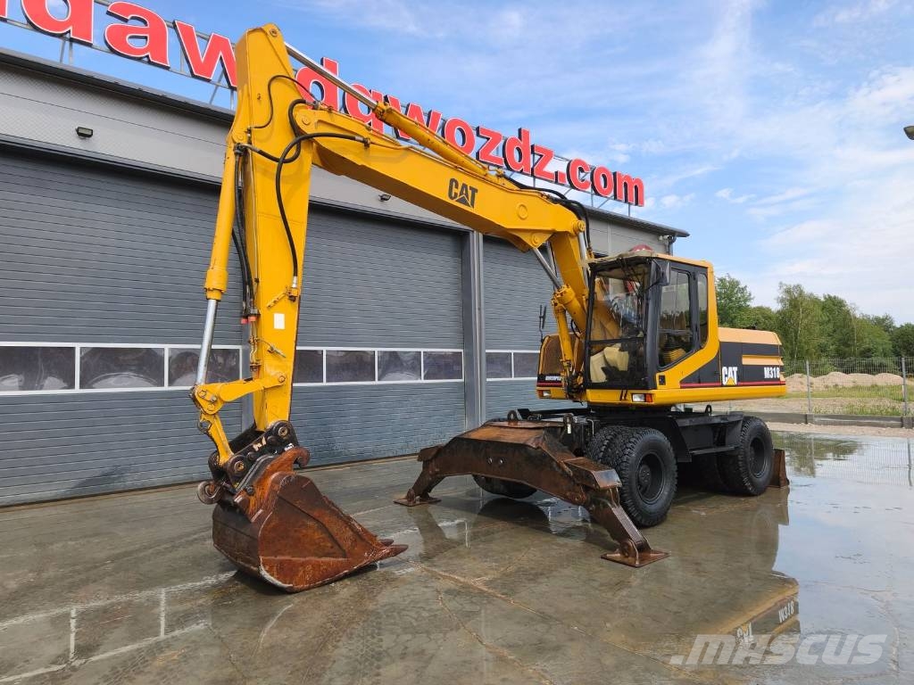 CAT M 318 Wielgraafmachines