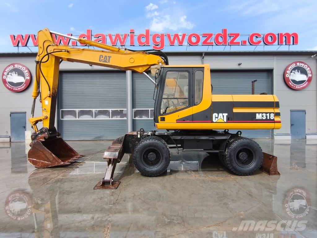 CAT M 318 Wielgraafmachines