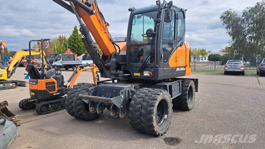 Develon DX 100 W-7 Kolová rýpadla