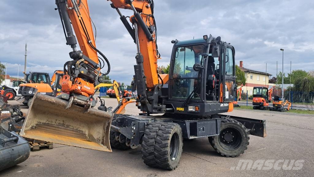 Develon DX 100 W-7 Kolová rýpadla