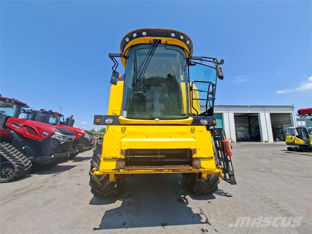 New Holland TC580 și Heder 5.4 m + cărucior حصادات
