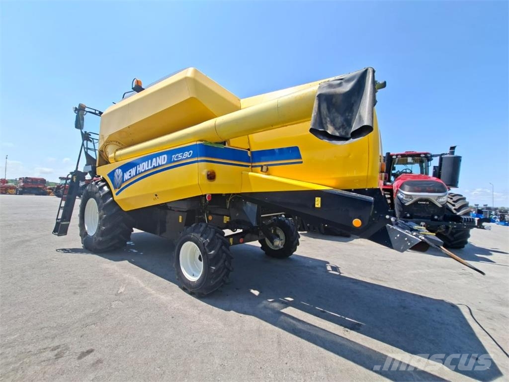 New Holland TC580 și Heder 5.4 m + cărucior حصادات