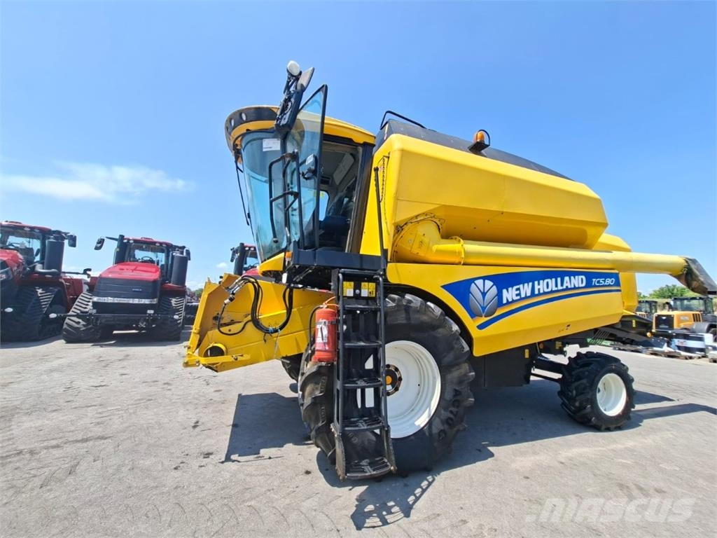 New Holland TC580 și Heder 5.4 m + cărucior حصادات