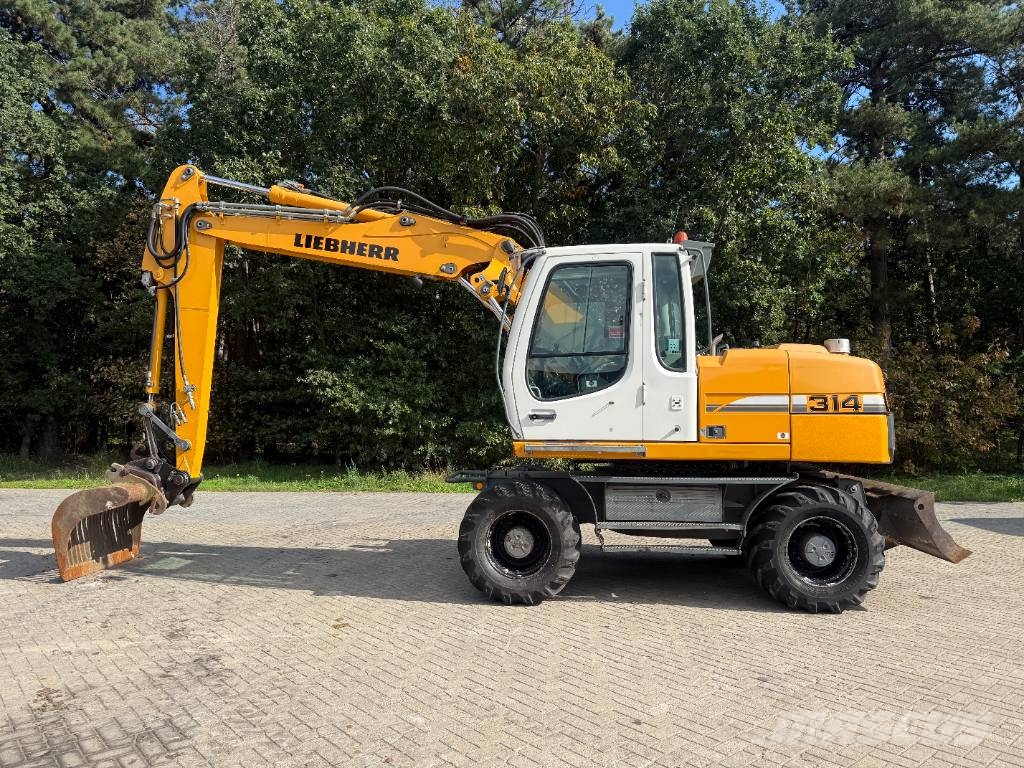 Liebherr A 314 Litronic Bagri na kolesih