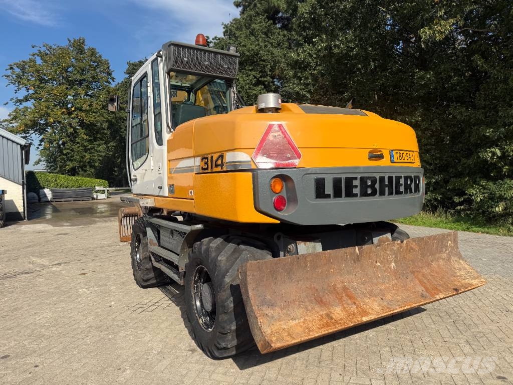 Liebherr A 314 Litronic Bagri na kolesih