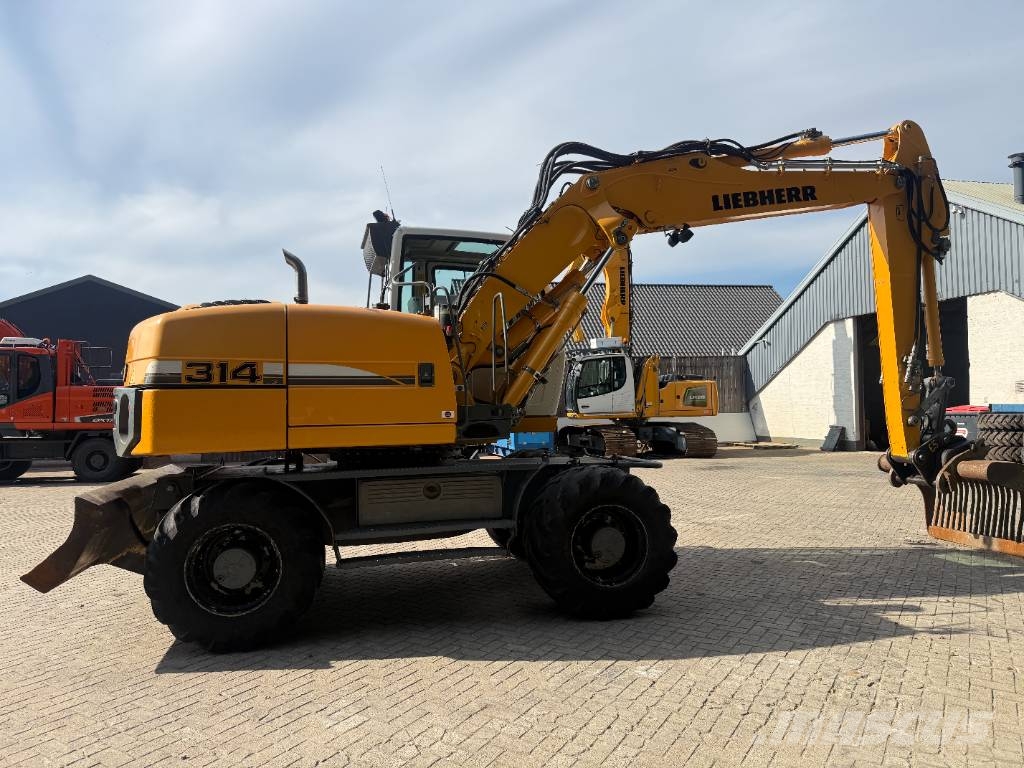Liebherr A 314 Litronic Bagri na kolesih