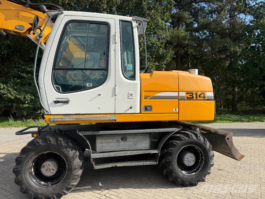 Liebherr A 314 Litronic Bagri na kolesih