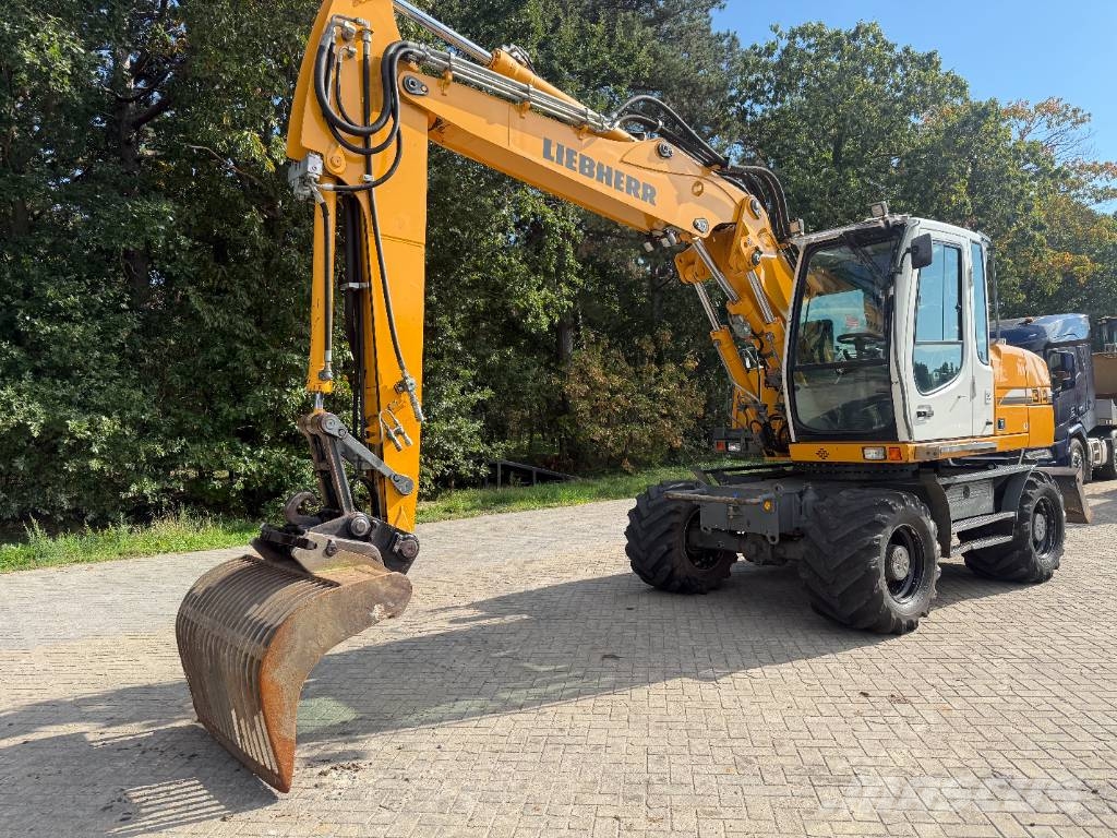 Liebherr A 314 Litronic Bagri na kolesih