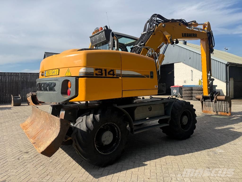 Liebherr A 314 Litronic Bagri na kolesih