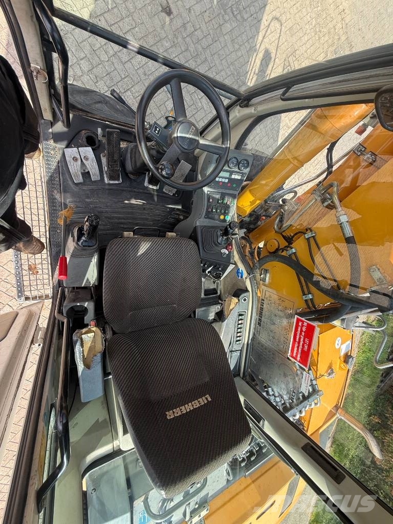 Liebherr A 314 Litronic Bagri na kolesih