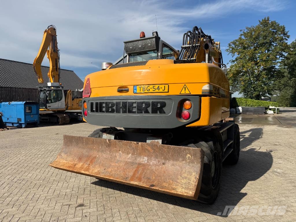 Liebherr A 314 Litronic Bagri na kolesih
