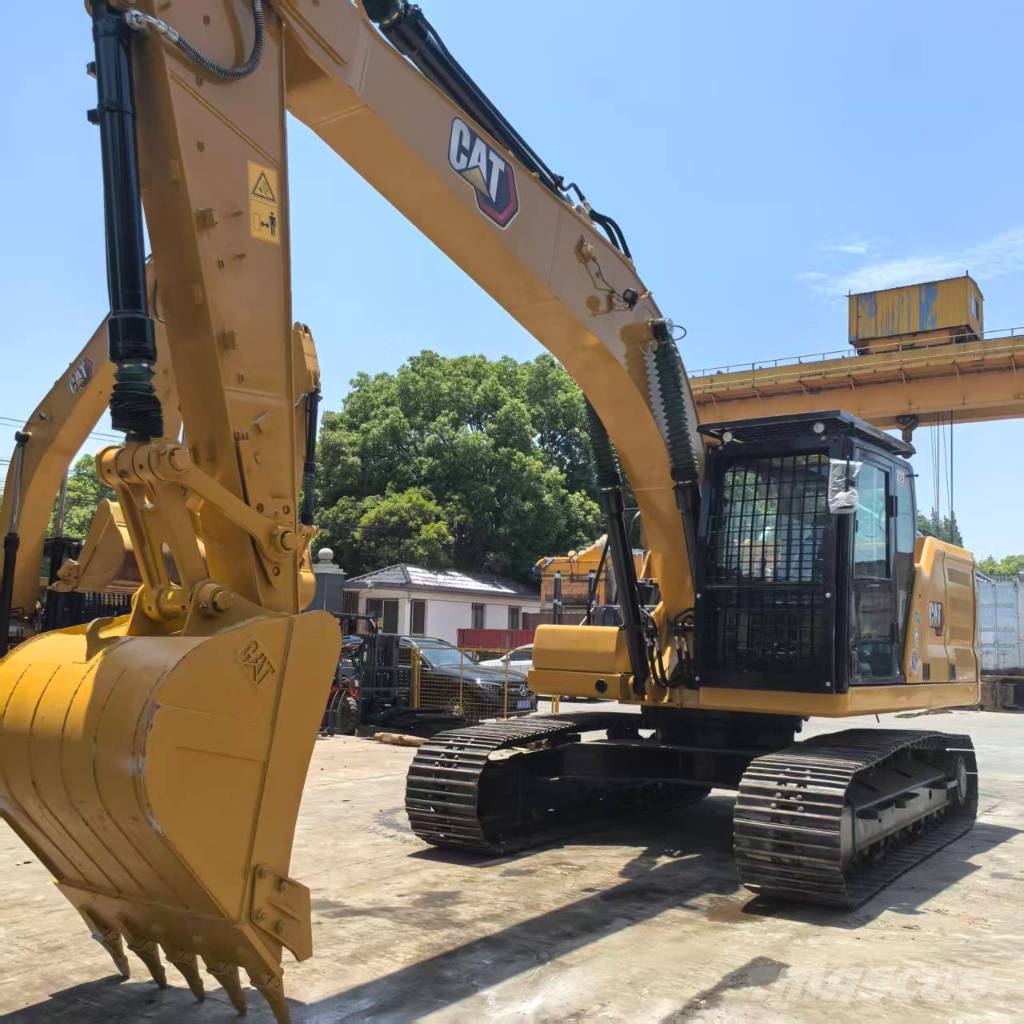 CAT 323 Pásová rýpadla