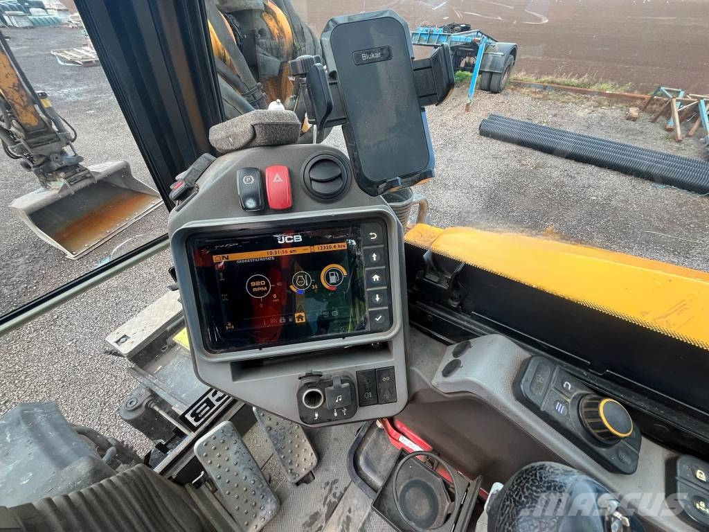 JCB Hydradig 110W Bagri na kolesih